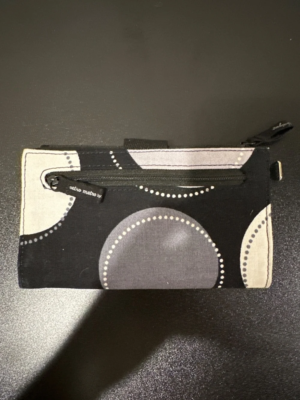 Black, white and grey soft sided wallet